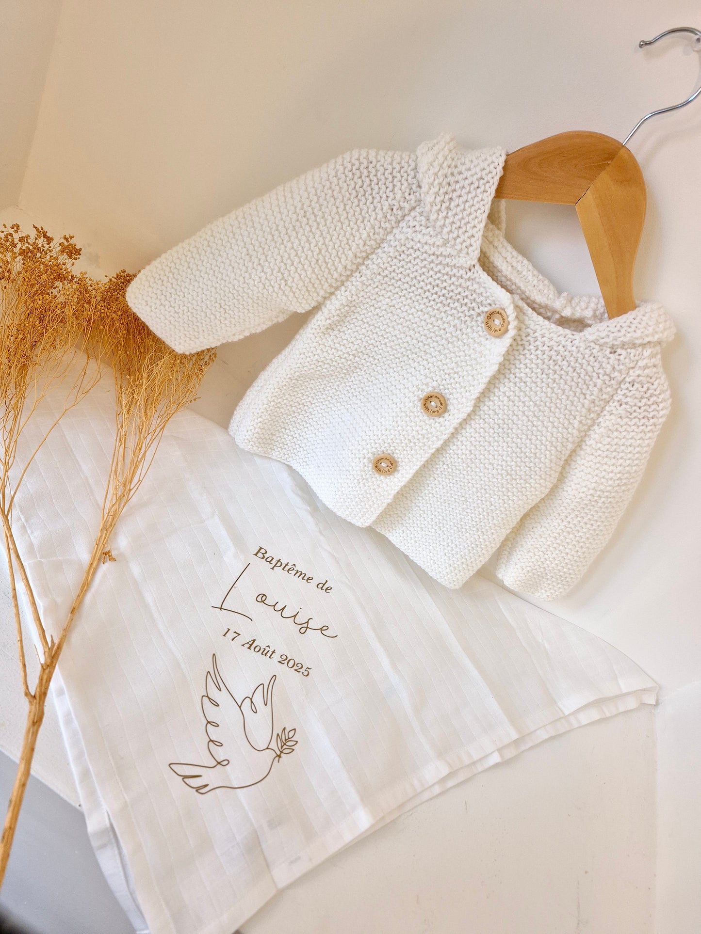 Gilet bébé en laine blanc