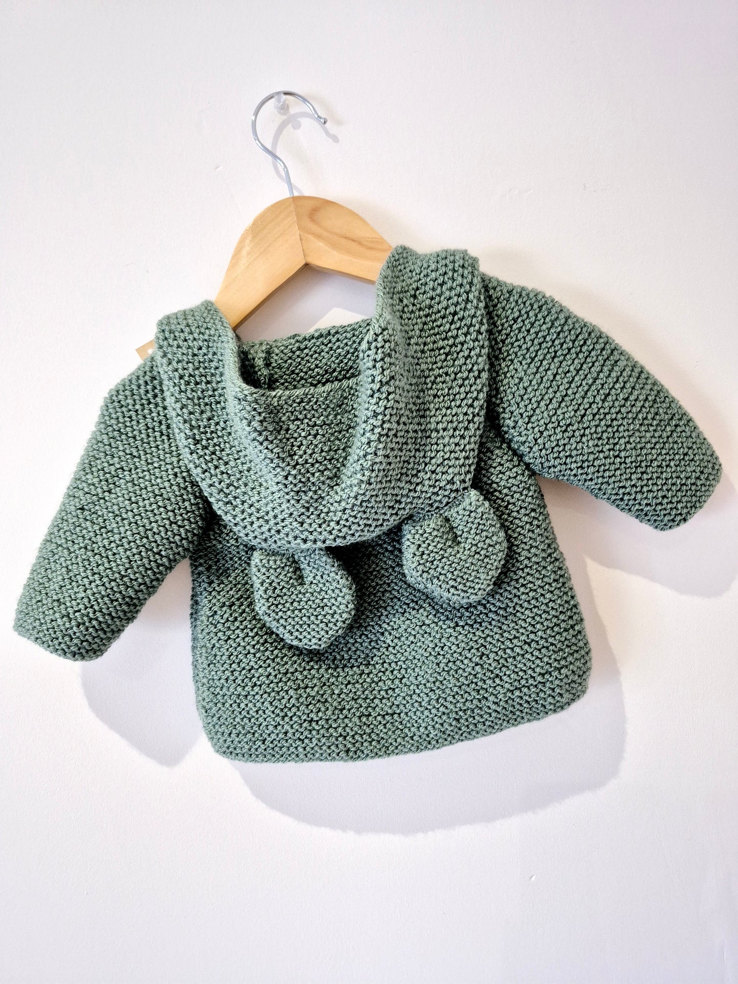 Gilet bébé en laine vert foncé