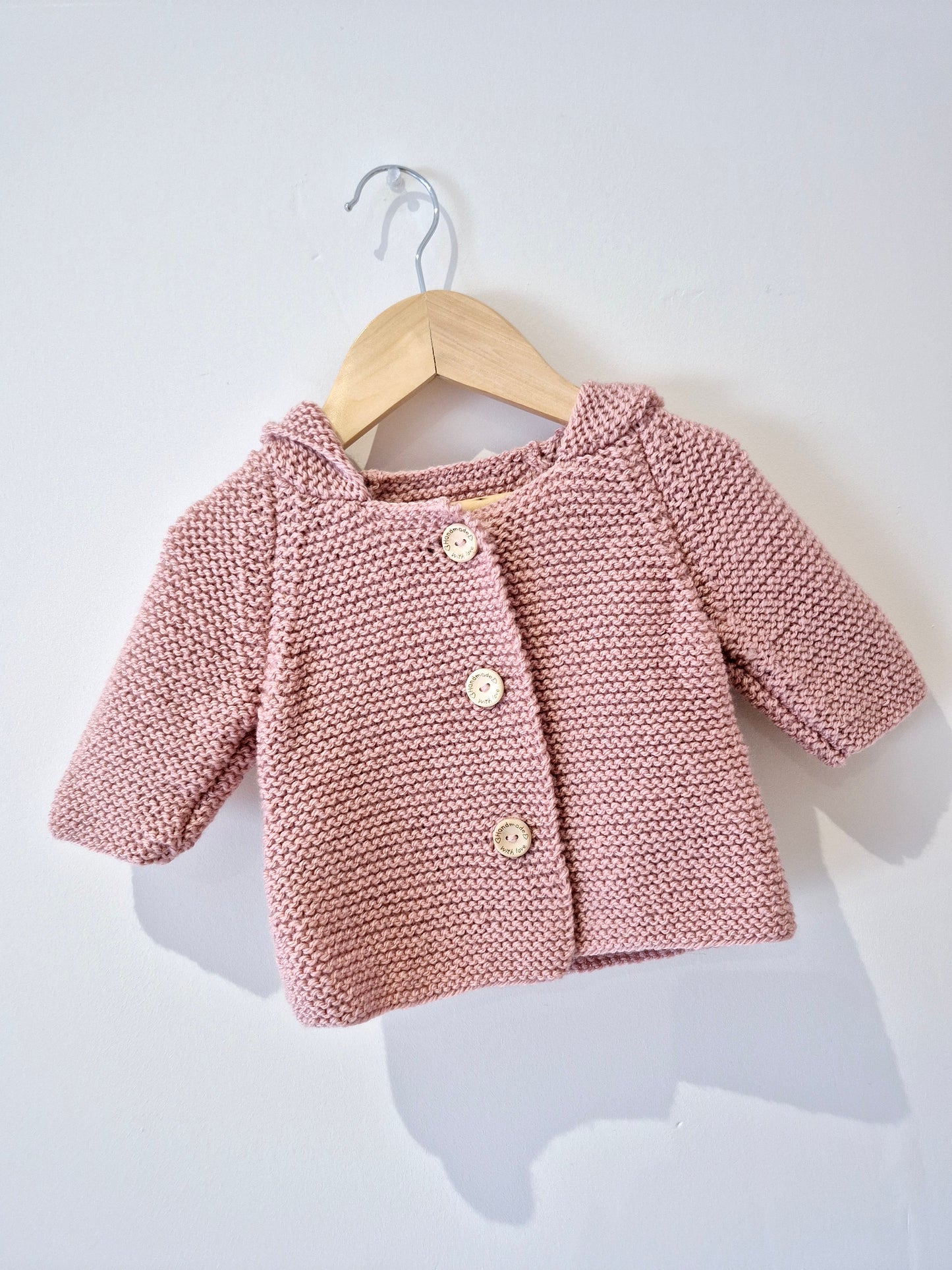 Gilet bébé en laine vieux rose