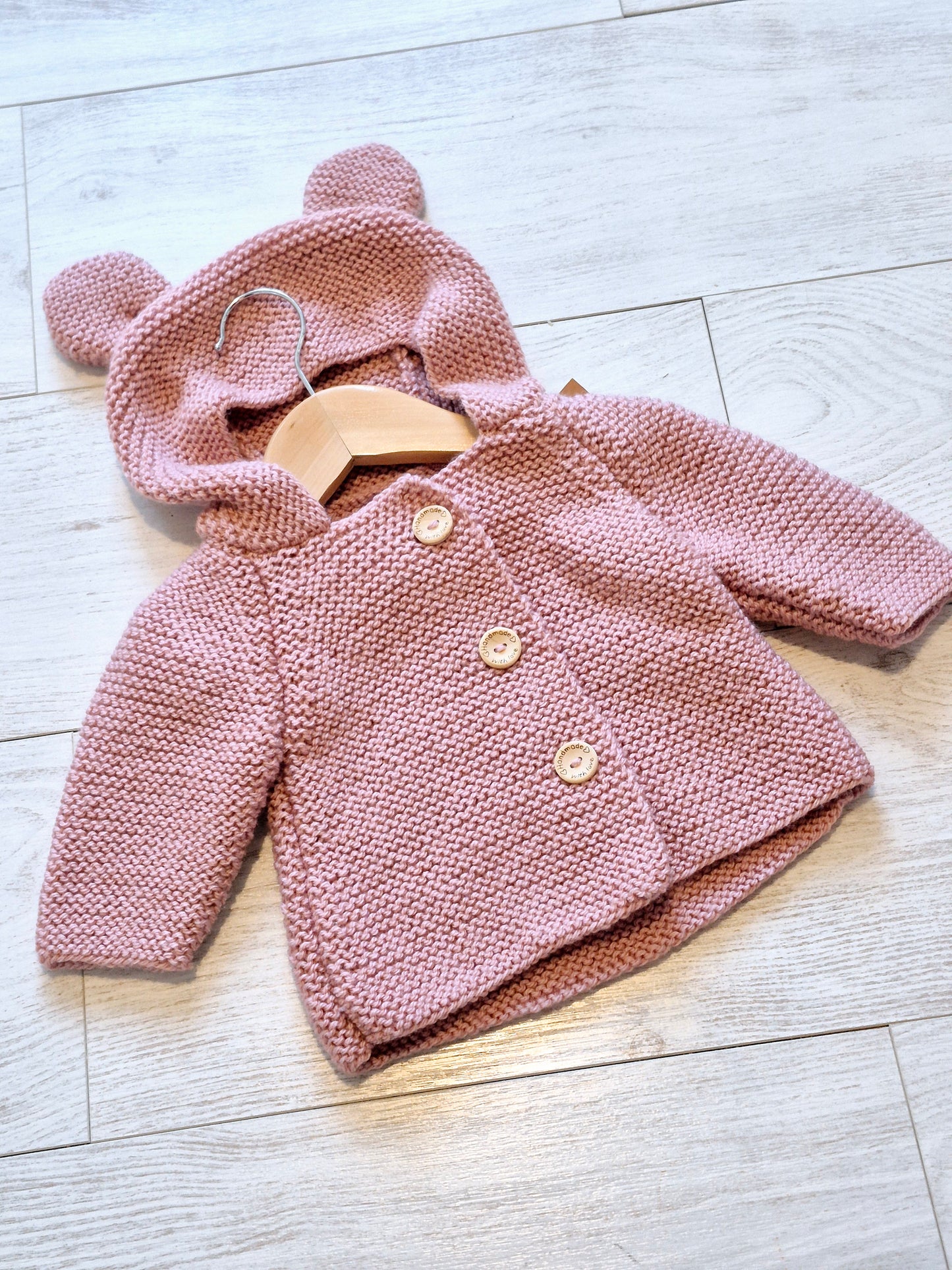 Gilet bébé en laine vieux rose