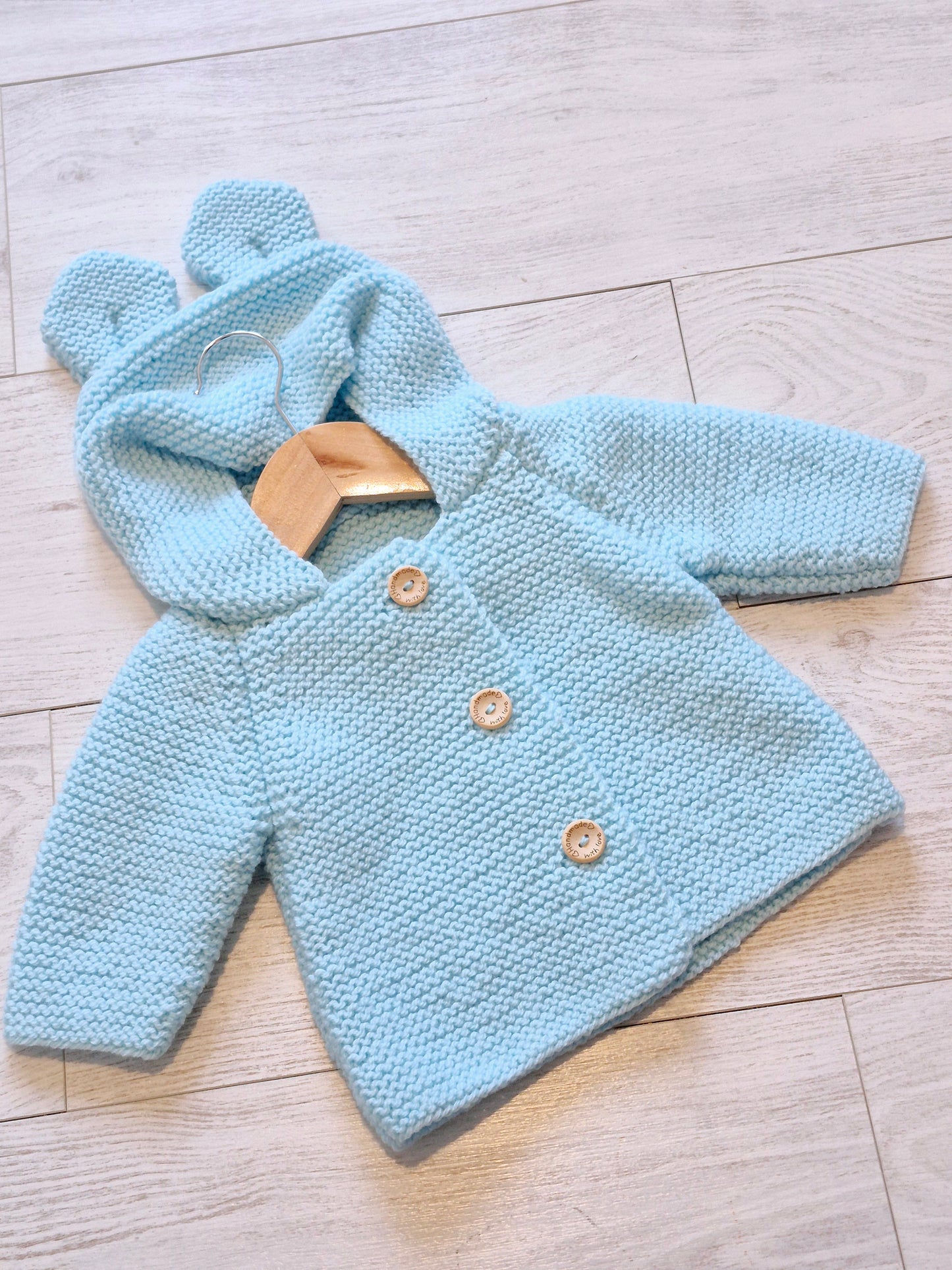 Gilet bébé en laine bleu ciel