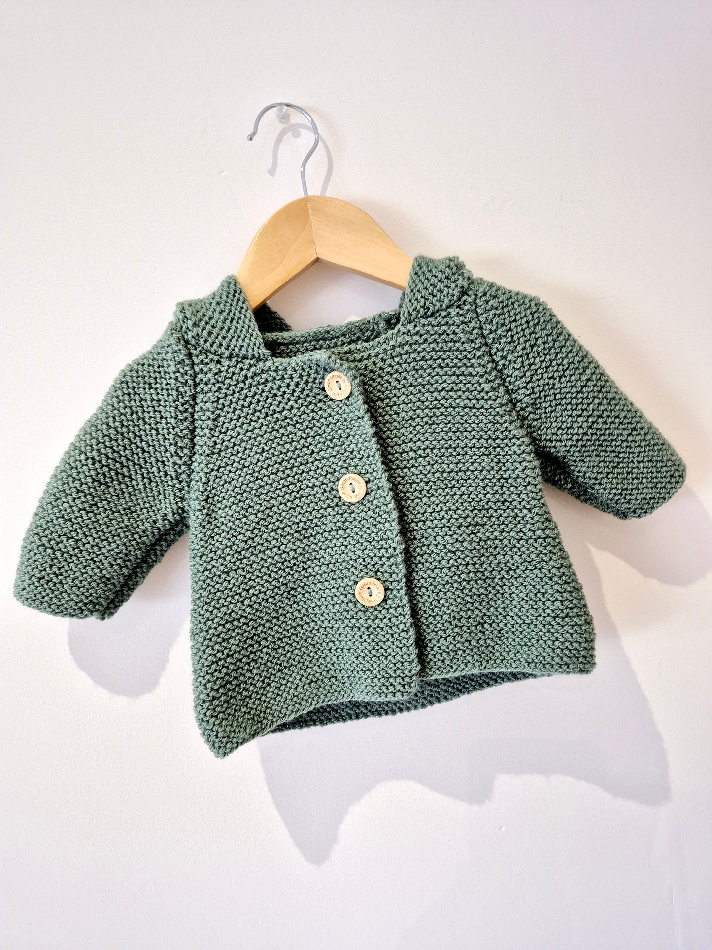 Gilet bébé en laine vert sapin
