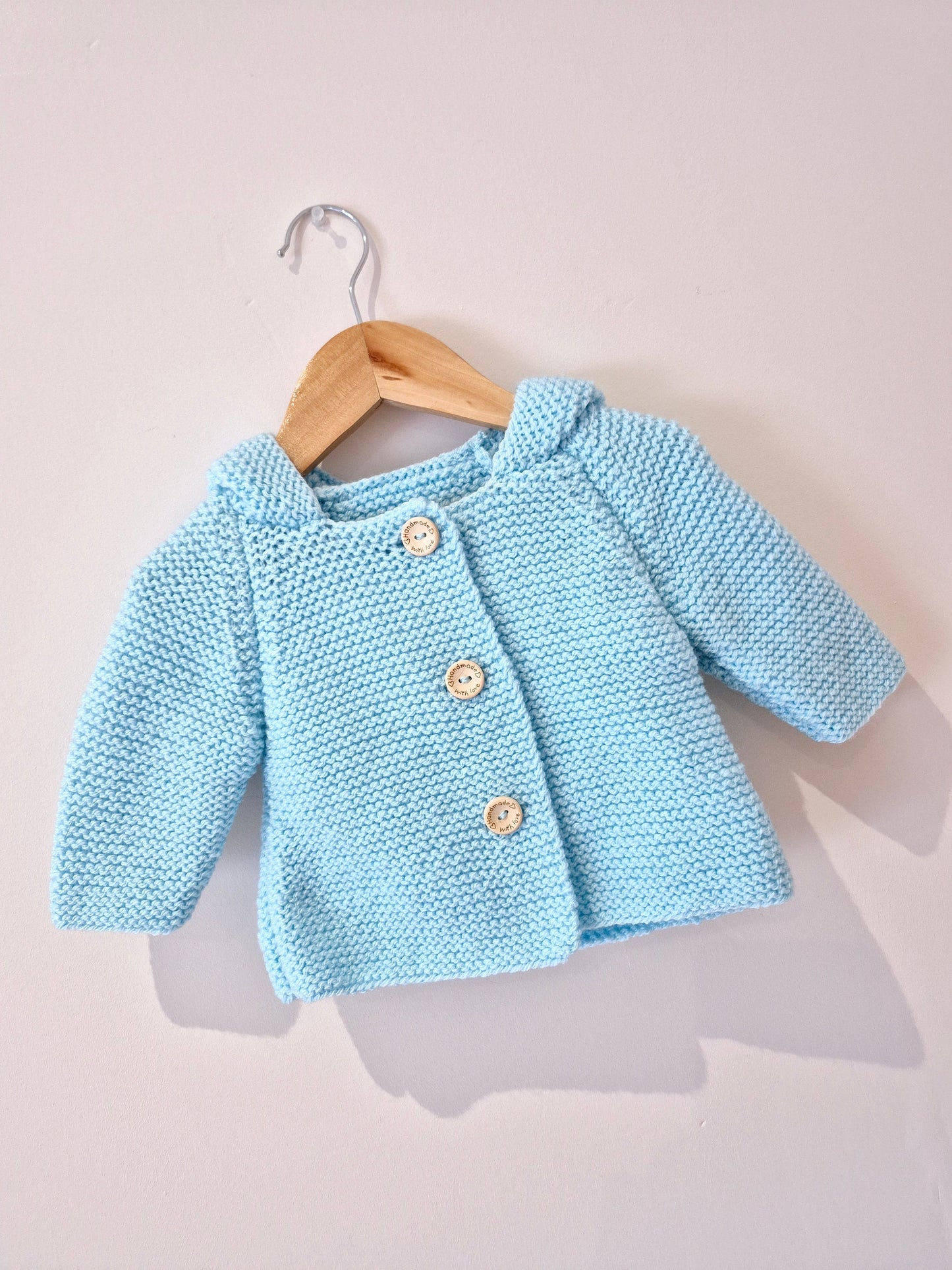 Gilet bébé en laine bleu ciel