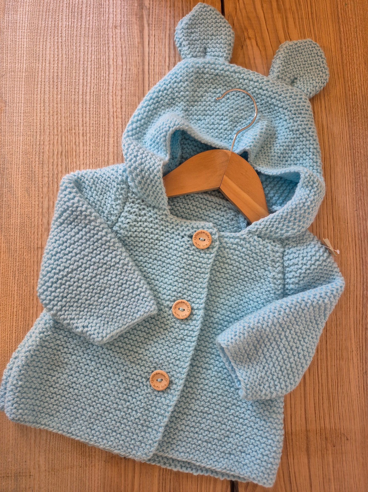 Gilet bébé en laine bleu ciel